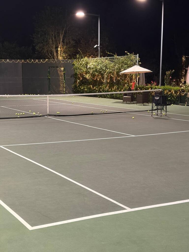 Beverly Hills tennis court ready for a late night coaching session.