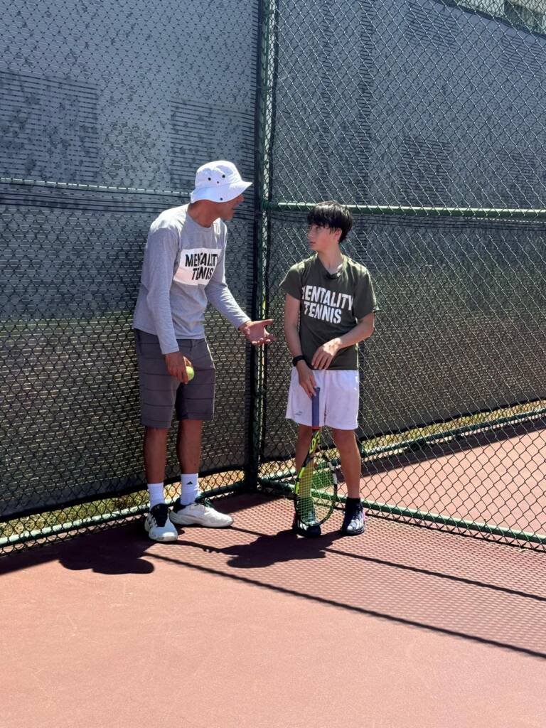 Daniel Joelson Tennis Instructor with Student