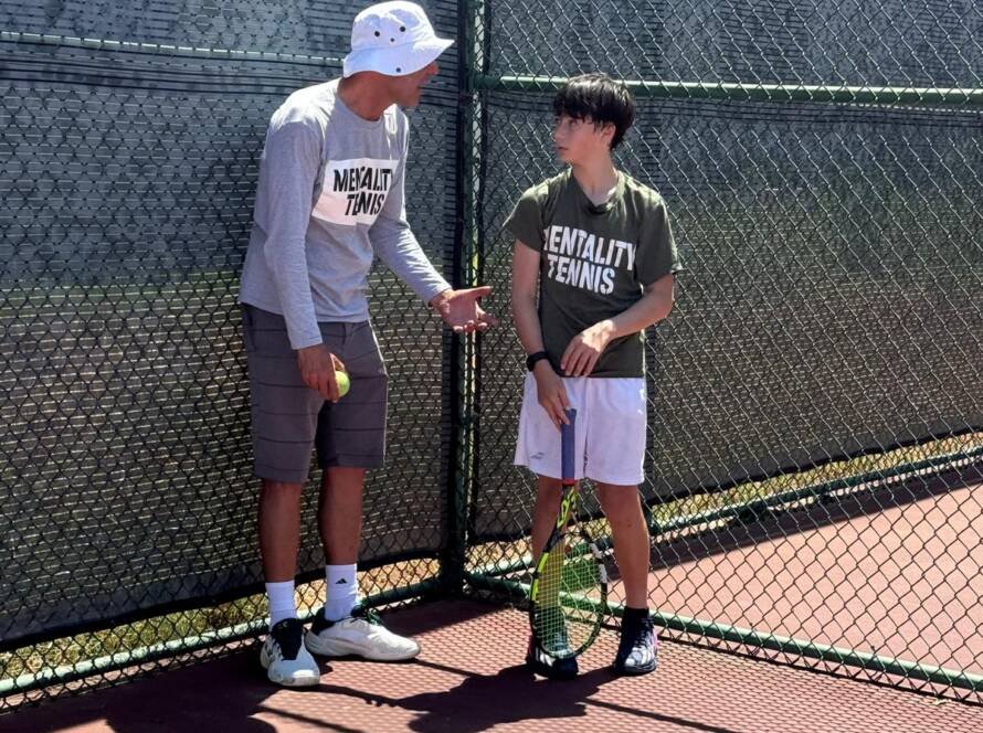 Daniel Joelson Tennis Instructor with Student