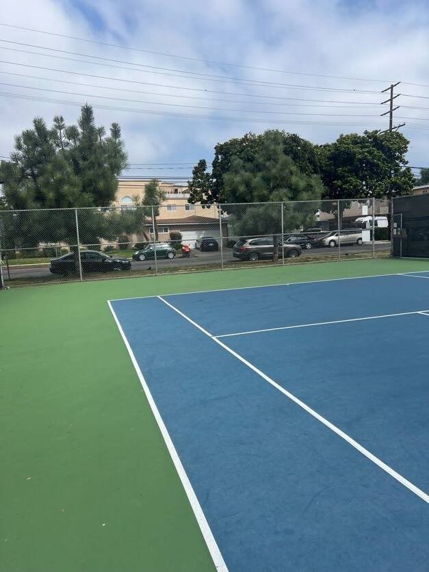 Blue and green outdoor hard court for tennis drills, rally practice and player development